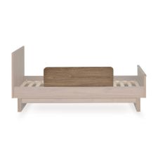 Quax uitvalbeschermer walnut 90 cm achteraanzicht van bed
